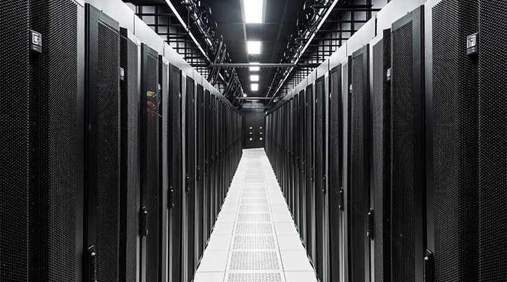 A row of cabinets inside a data center. (Photo: Cologix)