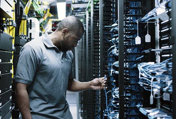 A technician works inside the Digital Realty data center inside 60 Hudson Street in New York City, a key aggregation point for global data traffic. (Photo: Digital Realty)