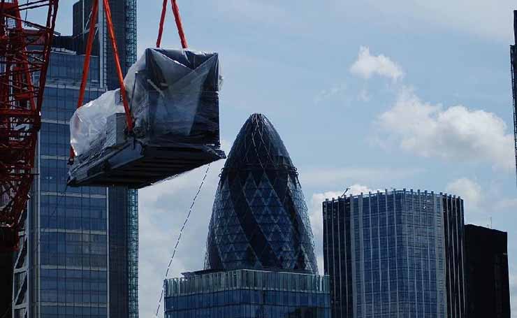 A generator delivery in central London. Our Executive Roundtable panel explores the status of the data center supply chain. (Photo: Fortrust)