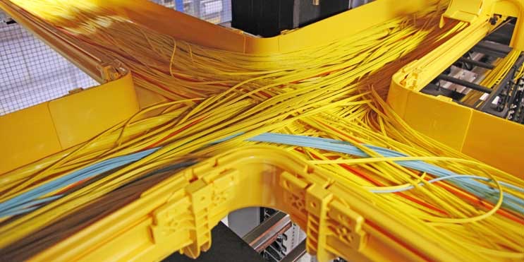 Network cabling fills fiber trays inside an Equinix data center. (Photo: Equinix)