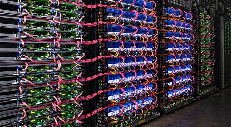 A four-rack &ldquo;pod&rdquo; of Google Tensor Processing Units (TPUs) and supporting hardware inside a Google data center. (Photo: Google)