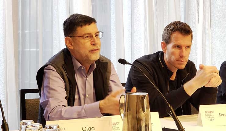 Intel&rsquo;s Gadi Singer (left) speaks at the O&rsquo;Reilly Artificial Intelligence Conference in New York. At right is Sean Gourley, CEO and founder of machine intelligence firm Primer. (Photo: Rich Miller)