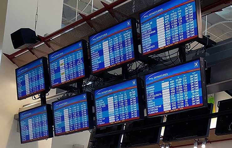 Airports are constantly tapping information systems to update schedules in real time. There&rsquo;s a data center behind that. (Photo: Rich Miller)