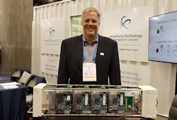 Forced Physics CEO and founder Scott Davis with a server assembly with servers attached to both sides of the Forced Physics JouleForce Conductor cooling unit. (Photo: Rich Miller) Forced Physics CEO and founder Scott Davis with a server assembly with servers attached to both sides of the Forced Physics JouleForce Conductor cooling unit. (Photo: Rich Miller)
