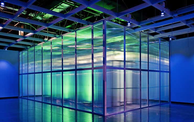 An illuminated rack containment system within an Aligned Energy facility. (Photo: Aligned Energy)