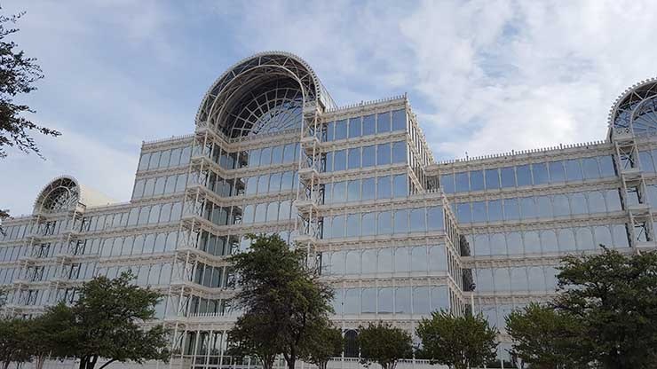 The glass facade of the Dallas Infomart, the leading carrier hotel and connectivity hub in Dallas, which was acquired by Equinix in 2018. (Photo: Rich Miller)
