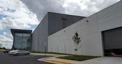 The front facade of Sterling V, showing the glass exterior on the three-story Class A office space. (Photo: Rich Miller) The front facade of Sterling V, showing the glass exterior on the three-story Class A office space. (Photo: Rich Miller)