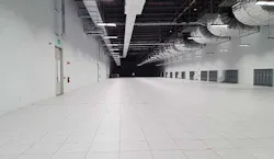 A look at the length of the 5 megawatt, 34,000 square foot data hall inside RagingWire’s TX1 data center in Garland, Texas. (Photo: Rich Miller) A look at the length of the 5 megawatt, 34,000 square foot data hall inside RagingWire’s TX1 data center in Garland, Texas. (Photo: Rich Miller)