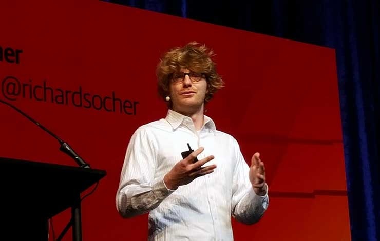 Richard Socher, Chief Scientist at Salesforce, announces the new Einstein suite of AI capabilities. (Photo: Rich Miller)
