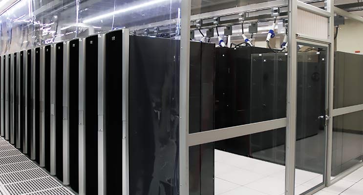 By implementing an effective airflow containment strategy, it is possible to see optimized cooling system efficiency, improved Power Usage Effectiveness (PUE) and additional equipment capacity, all without having to expand a facility&rsquo;s footprint. (Photo: Simplex)