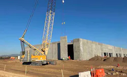 A pre-fabricated concrete section being hoisted into place during the construction of a Compass Datacenters campus. (Photo: Compass Datacenters) A pre-fabricated concrete section being hoisted into place during the construction of a Compass Datacenters campus. (Photo: Compass Datacenters)