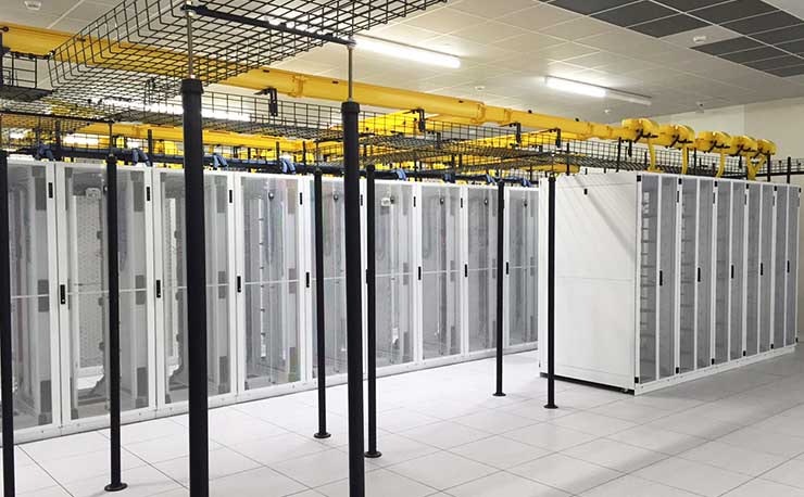 Cabinets inside a data hall in an EdgeConneX data center facility. (Photo: EdgeConneX)