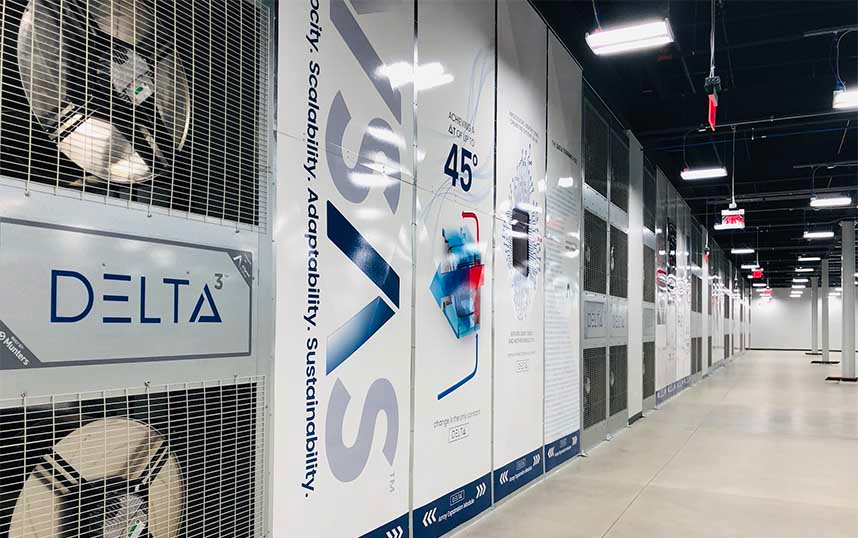 A row of Delta Cube cooling units in a data hall inside an Aligned Data Centers facility.
