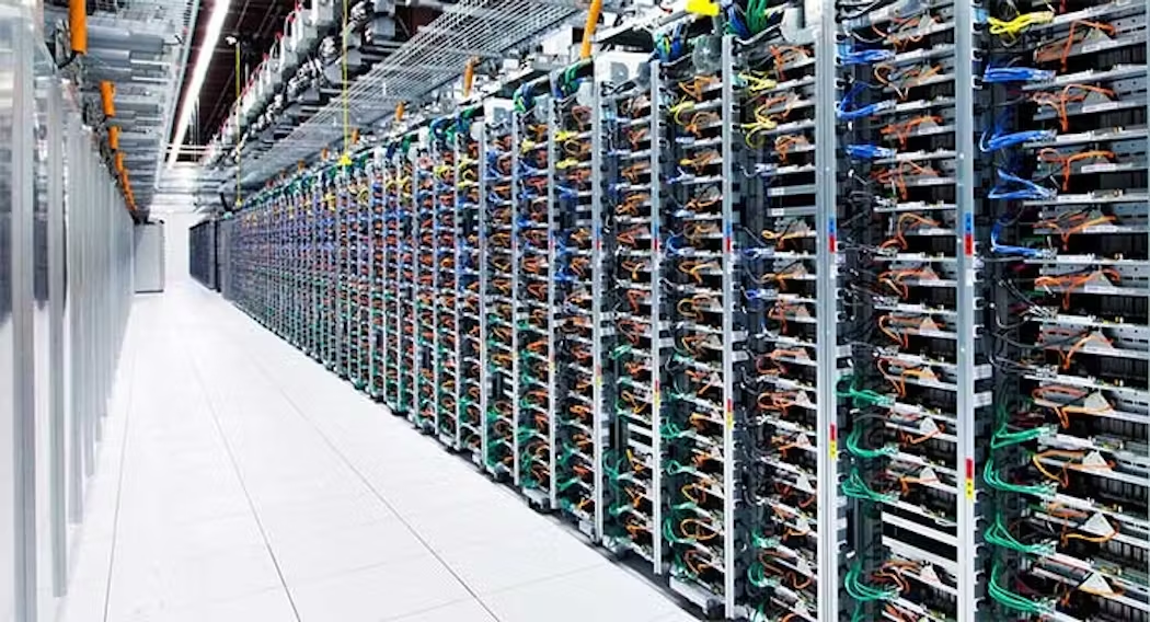 A long row of racks housing servers inside the Google data center in Mayes County, Oklahoma.