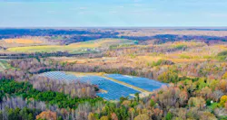 Aerial view of a solar farm in the North Carolina countryside. Aerial view of a solar farm in the North Carolina countryside.