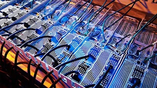Servers immersed in a liquid cooling solution from GRC (Green Revolution Cooling).