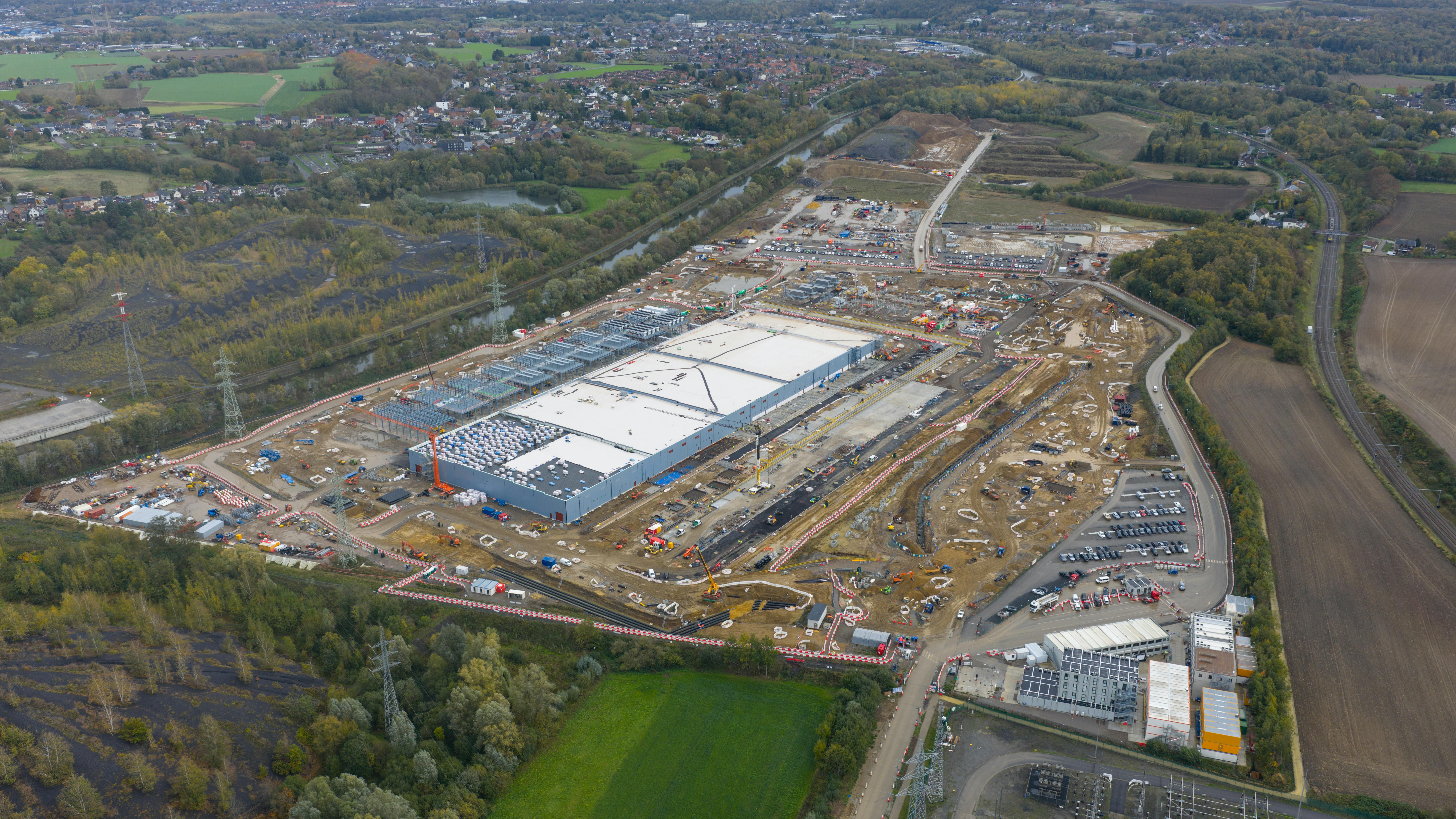 Aerial drone photo of large new data center construction in Farciennes, Belgium, focusing on AI, digitization, and sustainable expansion.