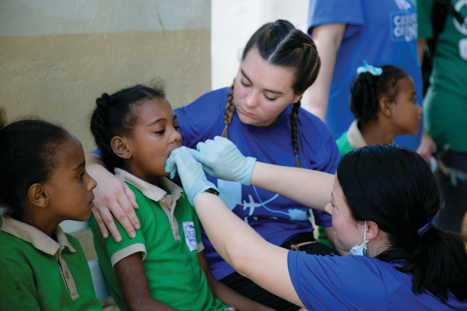 A member of Dr. Steven M. Pilpovich's team provides oral care at Good Samaritan Hospital. Dr. Pilpovich was among a group of US dentists who recently aided in the revitalization of the hospital's dental outreach program.