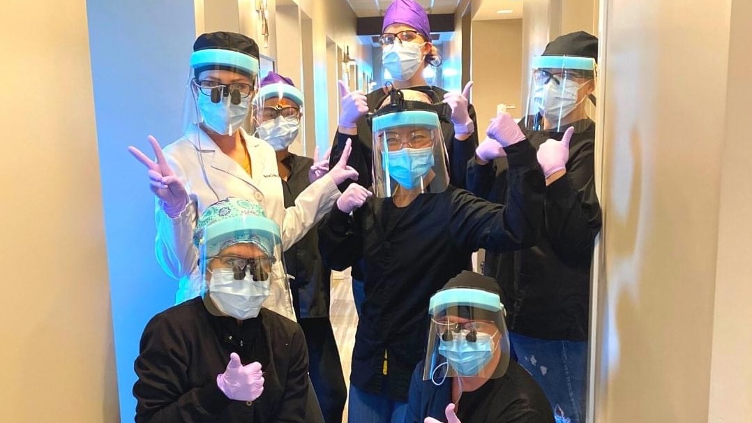 The team members of Dr. Christina Kulesa's Northstar Family Dental office in Westerville, Ohio, show their enthusiasm for their practice.