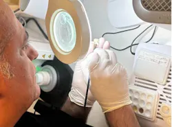 Figure 2. Crown being glazed while patient waits Figure 2. Crown being glazed while patient waits