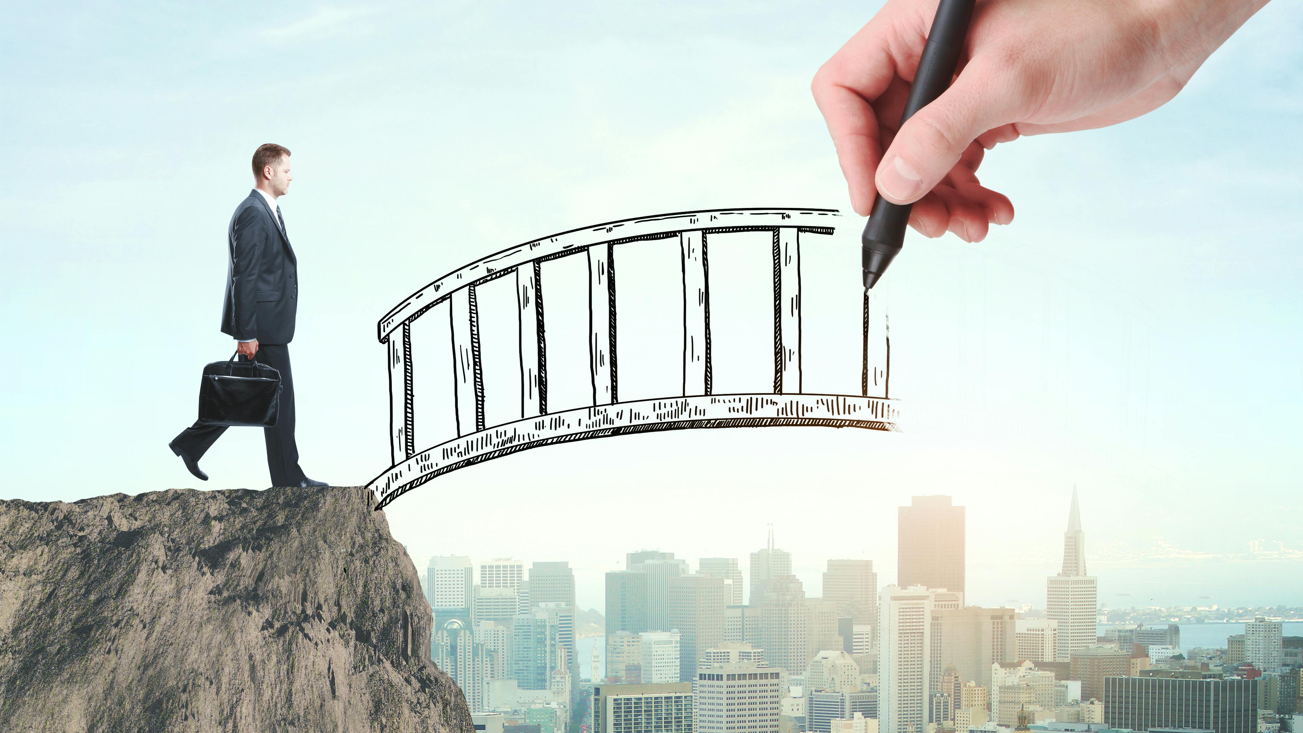 man about to step on a bridge that's being drawn