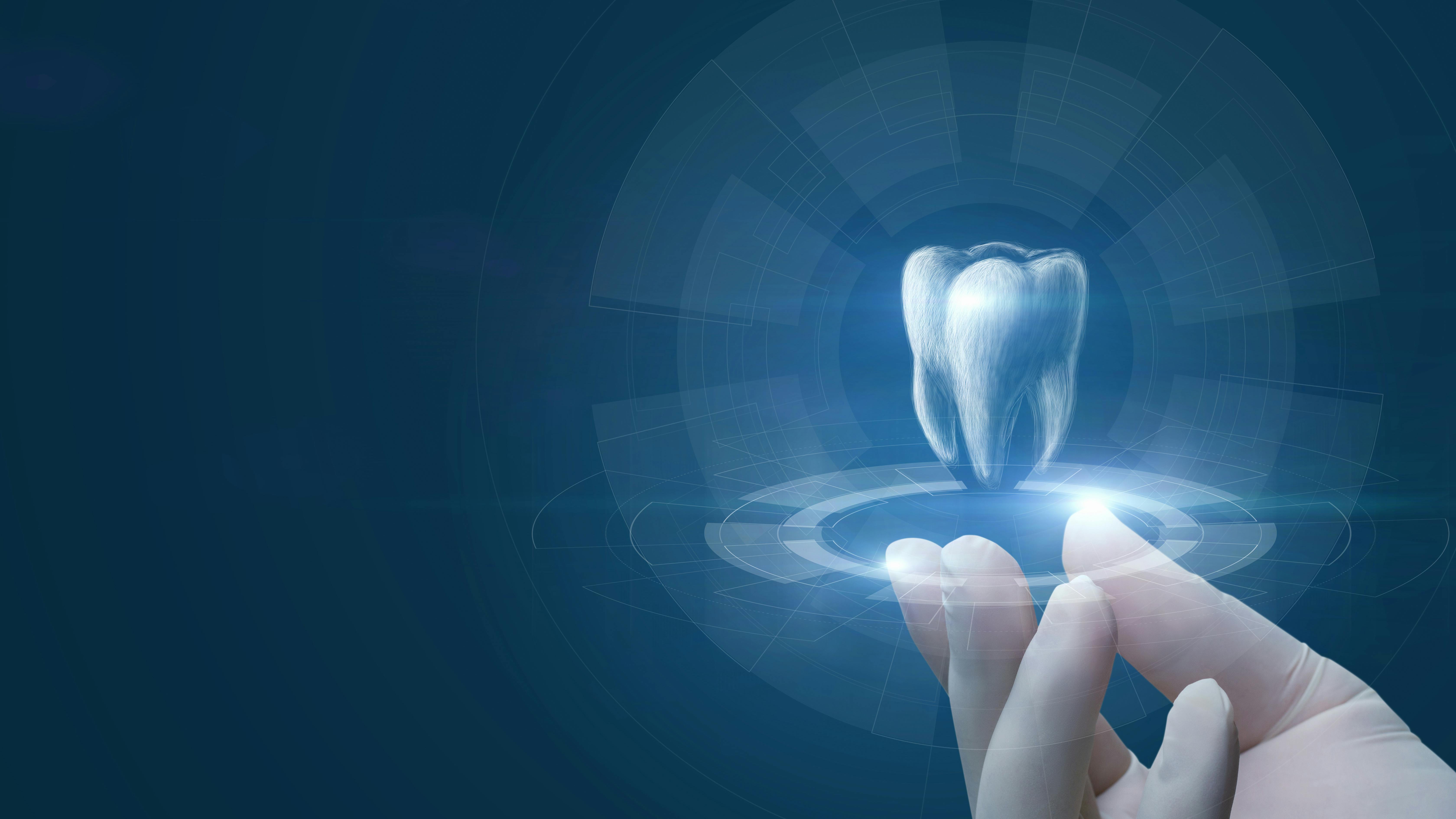 concept of a hand holding a digital tooth