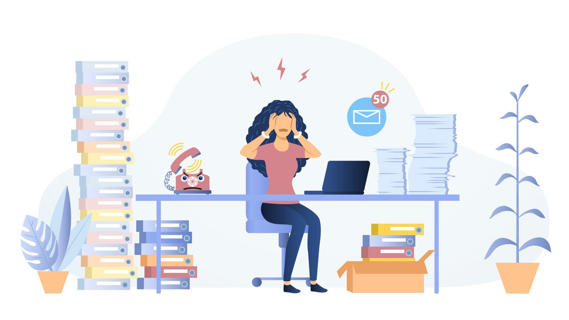 Frustrated woman sitting at desk with paperwork and full email inbox