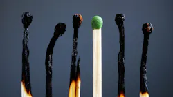 Several burnt matches surrounding one new match Several burnt matches surrounding one new match