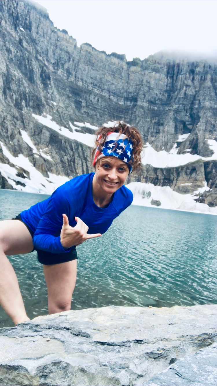 Dr. Stacey Gividen at Iceberg Lake in Glacier National Park, 4th of July, 2019