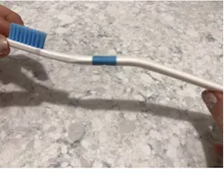 Figure 2: Side view of ZentFlex toothbrush Figure 2: Side view of ZentFlex toothbrush