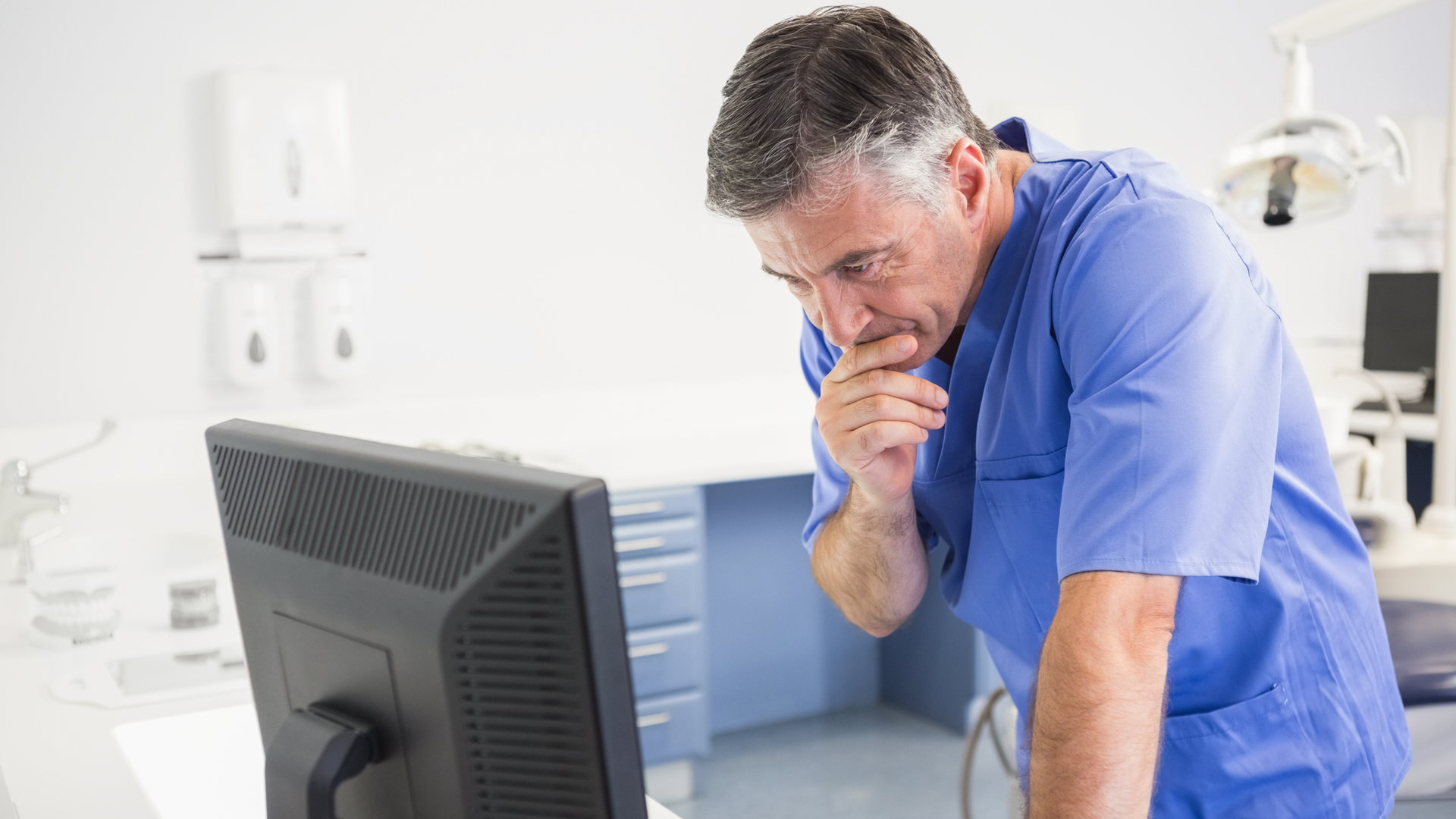 Dentist At Computer 5ea319ec6d619