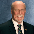 Larry R. Stewart, DDS, MS, FACD, FICD
