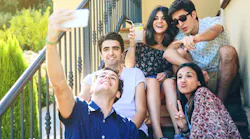 Young people taking a selfie Young people taking a selfie