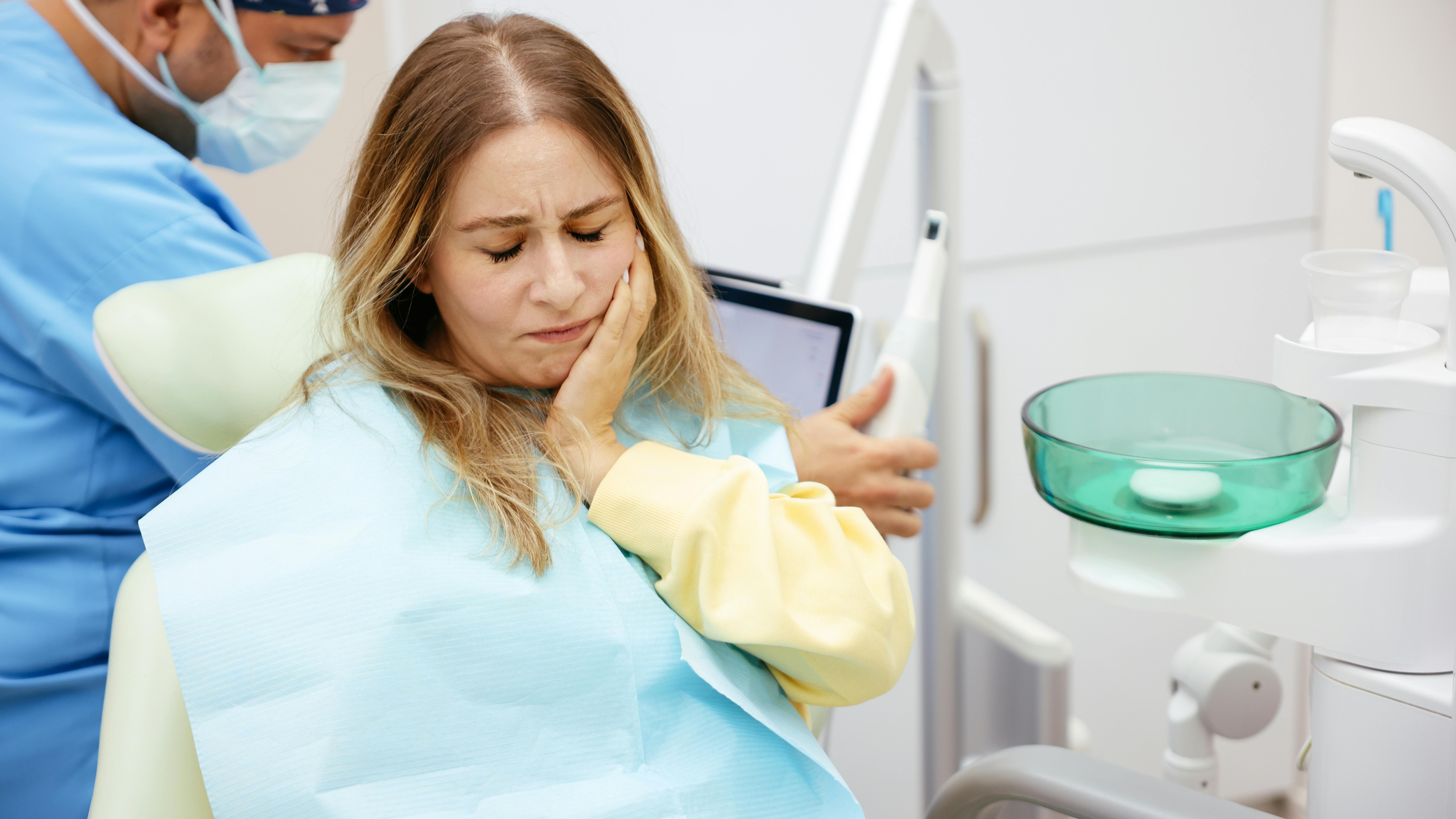 Woman with dental sensitivity