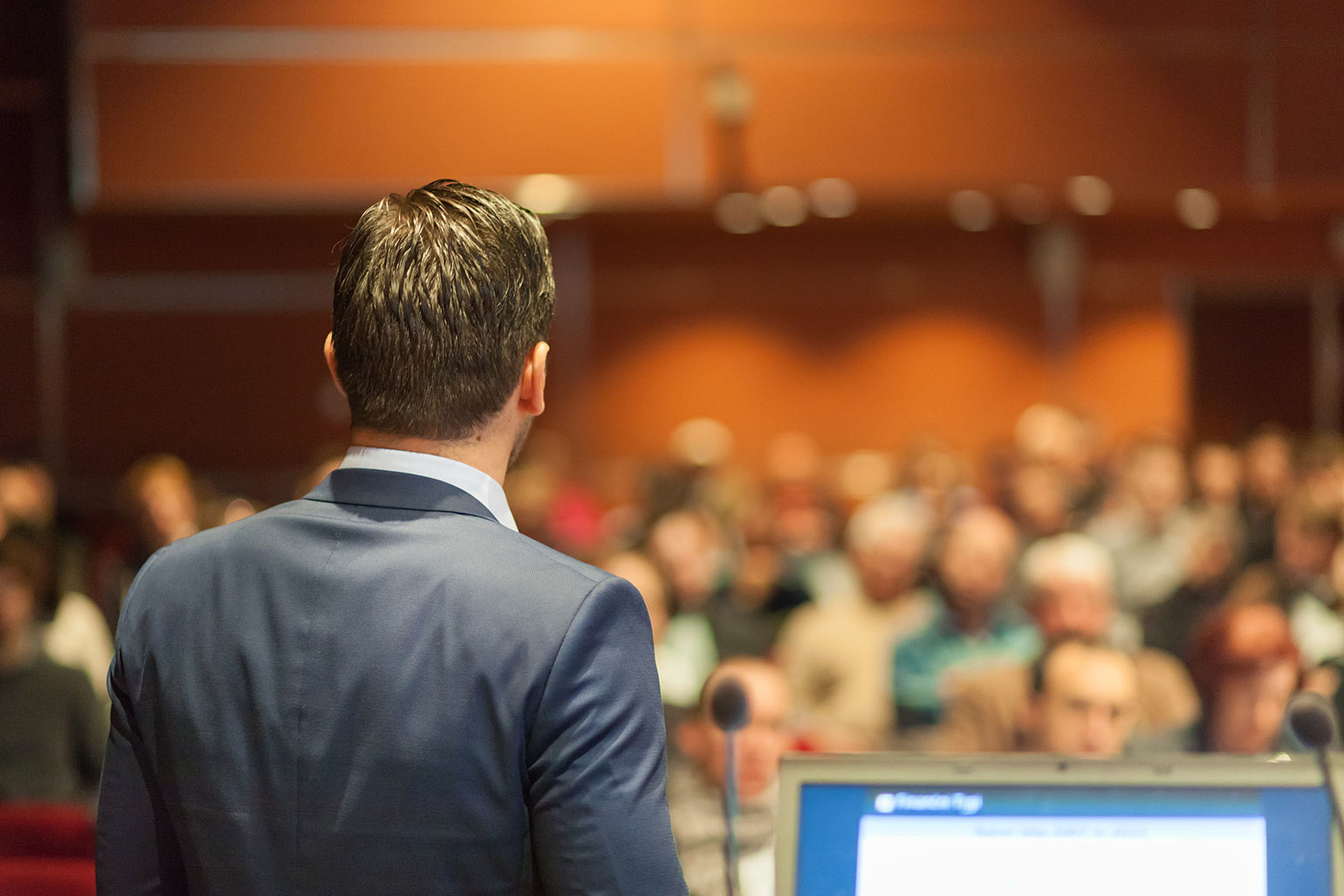 man giving presentation to audience