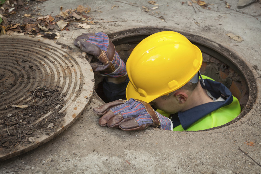 man entering confined space