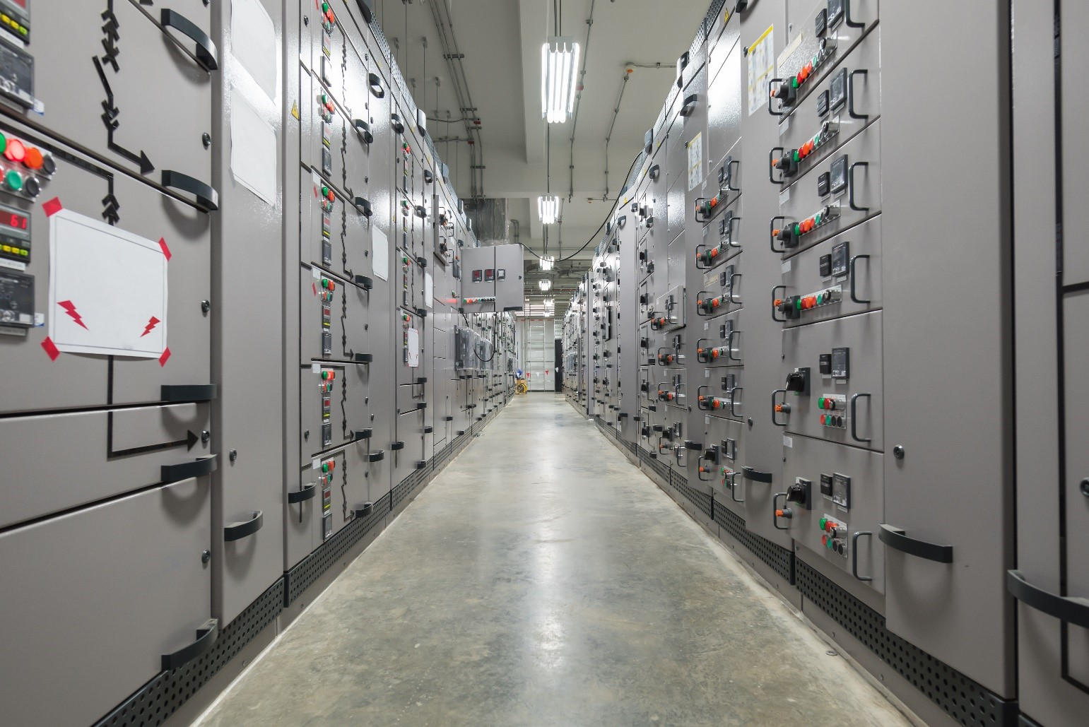 Typical electrical room with large electrical equipment with opposing fronts [NEC Tables 110.26(A)(1) or Table 110.34(A), Condition 3].