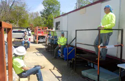 Construction workers practice social distancing at a break on a job site on April 9, 2020. Construction workers practice social distancing at a break on a job site on April 9, 2020.