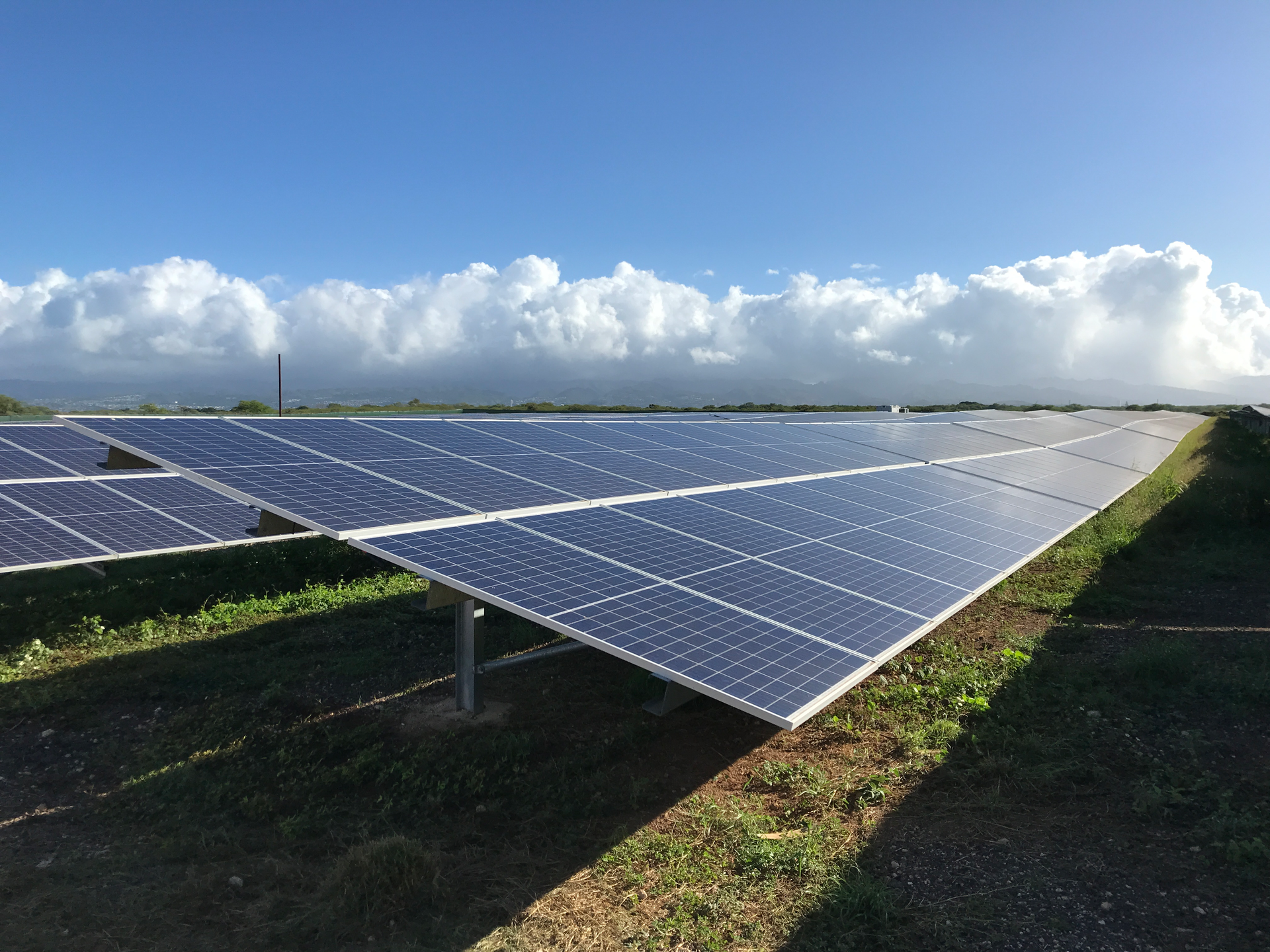 On the shores of historic Pearl Harbor, the 20MW West Loch Solar Project is owned by Hawaiian Electric on land that belongs to the U.S. Navy. It supplies all Oahu customers at one of the lowest rates among renewable resource projects.
