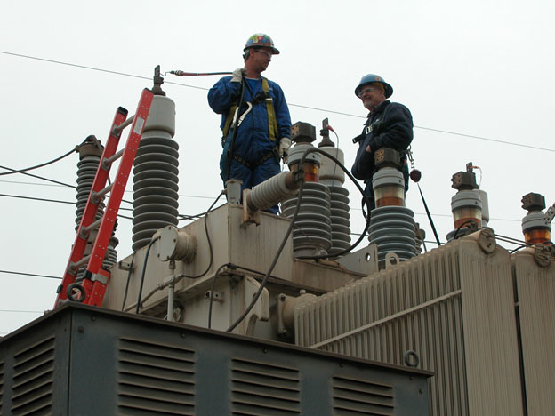 Photo 1. Qualified persons are often required to perform risk-filled tasks.