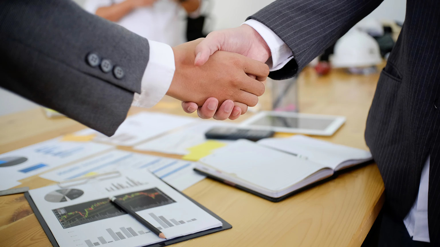 Businessmen In Suits Shaking Hands 6113ed39a83f6