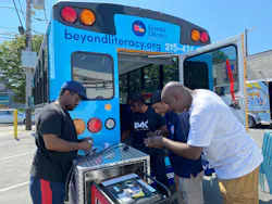 Working to wire the Beyond Literacy bus are (left to right): Attiim Roseborough; Zahir Rawls, The Academy of Industrial Arts (TAIA) student; Jemal Davis, BeLit IT tech and facilities coordinator, and Harold DeLoach, TAIA director of education and master electrician. Working to wire the Beyond Literacy bus are (left to right): Attiim Roseborough; Zahir Rawls, The Academy of Industrial Arts (TAIA) student; Jemal Davis, BeLit IT tech and facilities coordinator, and Harold DeLoach, TAIA director of education and master electrician.