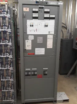 Photo 1. A typical UPS system and DC battery bank. Photo 1. A typical UPS system and DC battery bank.