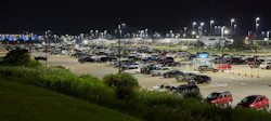 To get the best light uniformity, a photometric layout was used for Milwaukee Mitchell International Airport’s new lighting upgrade. Remote Lot A now includes LED luminaires that replaced high-pressure sodium luminaires. To get the best light uniformity, a photometric layout was used for Milwaukee Mitchell International Airport’s new lighting upgrade. Remote Lot A now includes LED luminaires that replaced high-pressure sodium luminaires.