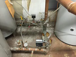 runs of FMC strewn about the water pipes and other piping systems in mechanical room runs of FMC strewn about the water pipes and other piping systems in mechanical room