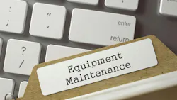 A folder with a tab that says 'Equipment Maintenance' rests on top of a keyboard. A folder with a tab that says 'Equipment Maintenance' rests on top of a keyboard.