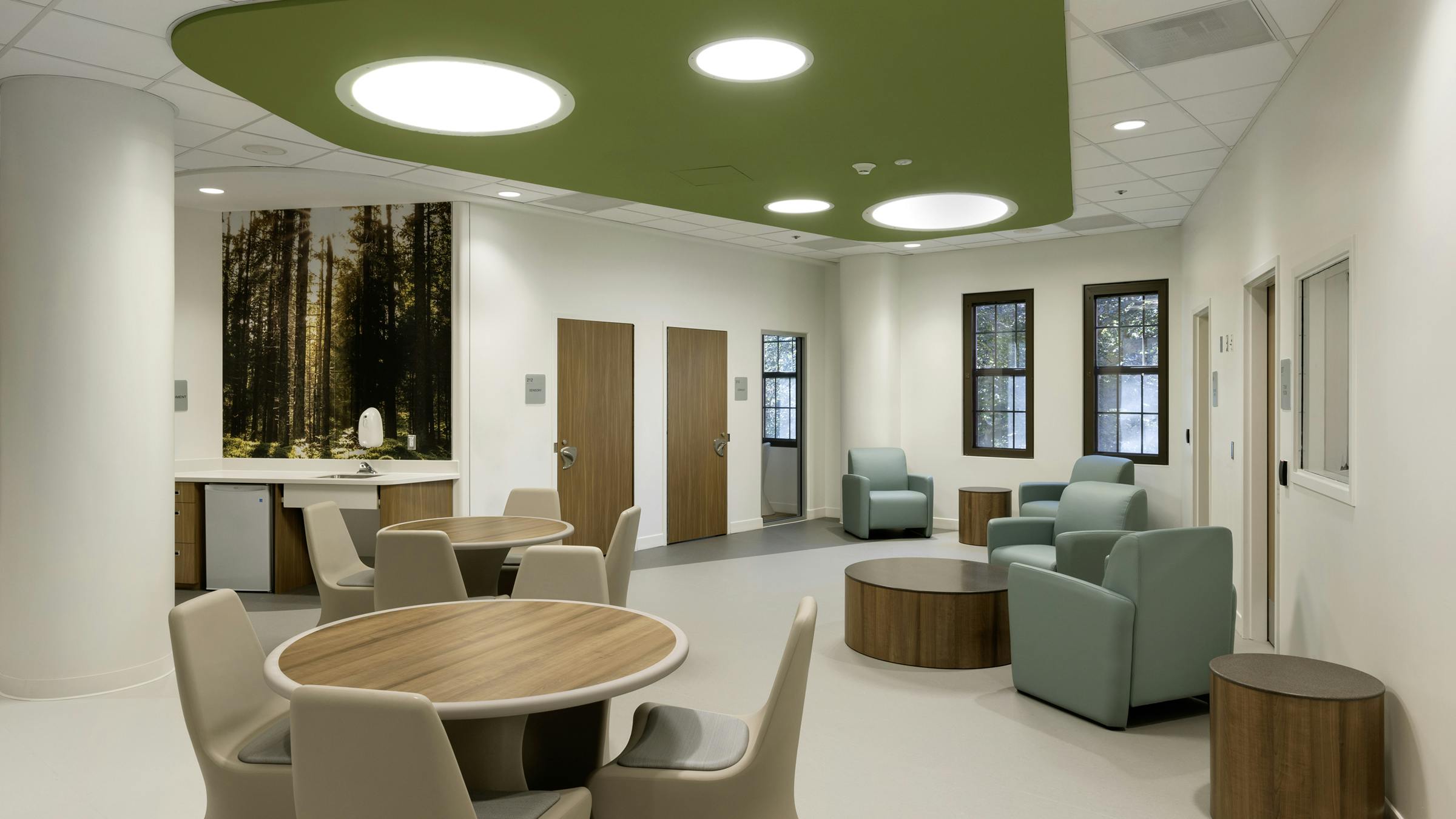 Rhode Island-based Butler Hospital Short Stay Unit includes common areas with round ceiling troffers that meet stringent performance standards for tamper- and ligature-resistance while complementing the design.