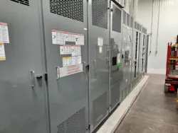 Photo 2. Dry-type transformer with vents at top and bottom. Internal fans help to cool the transformer. Photo 2. Dry-type transformer with vents at top and bottom. Internal fans help to cool the transformer.