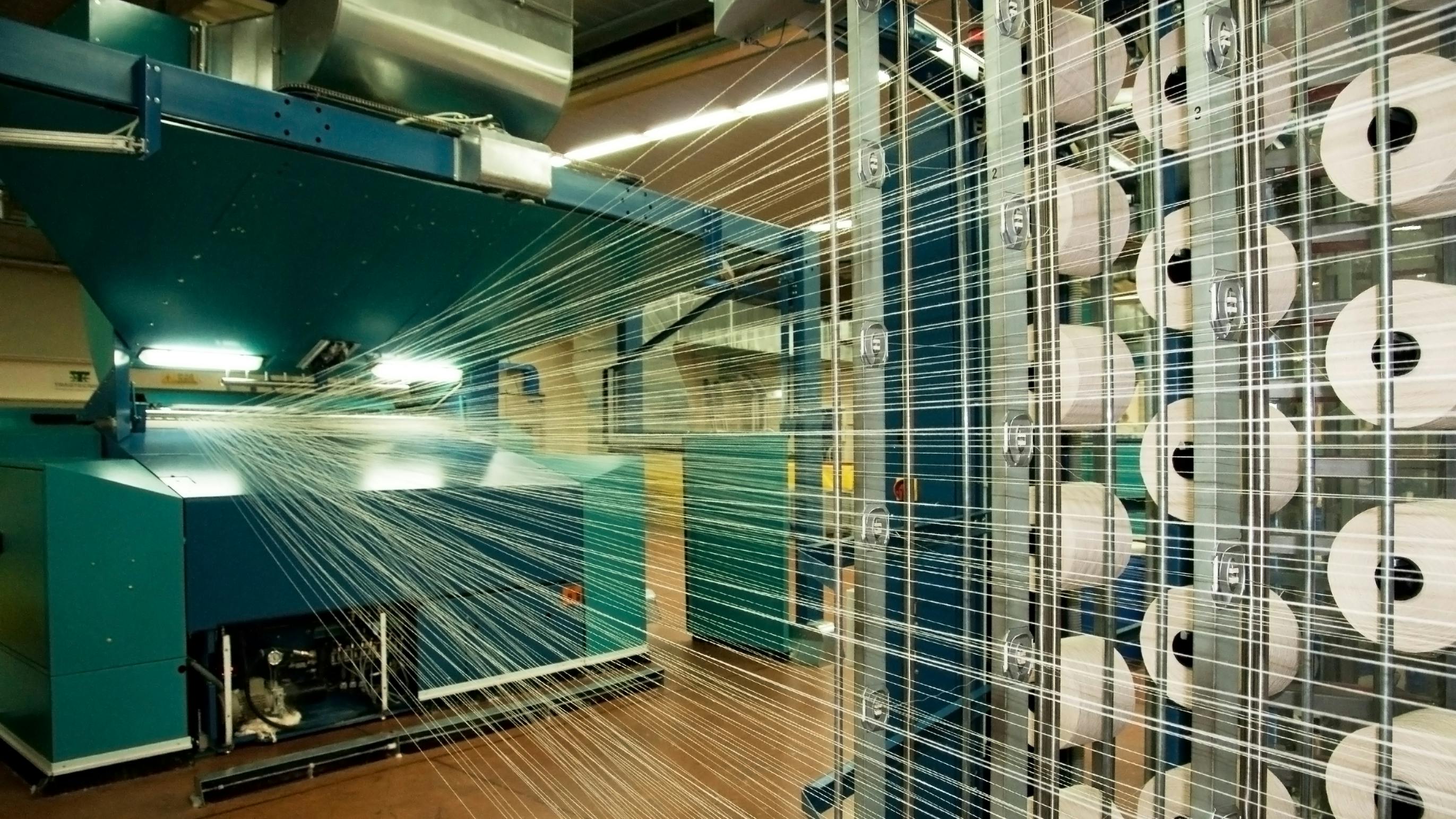 Machinery at a textile factory is a good example of equipment that likely needs more frequent maintenance/cleaning due to fiber build up that can increase fire risk.