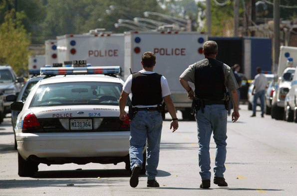 Chicago Police are seen near Windy City Core Supply Inc an autoparts warehouse where 36yearold Salvador Tapia killed six people on Aug 27 2003 a few months after he39d been fired Photo by Tim BoyleGetty Images